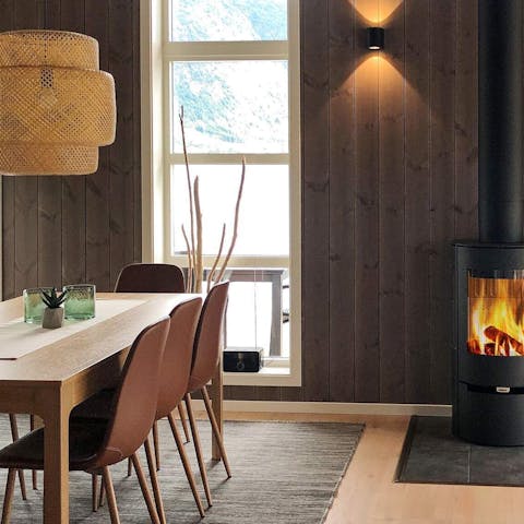 Enjoy cosy meals with your family and friends, warmed by the wood burning stove 