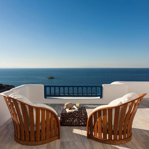 Start the day with a cup of coffee on the private balcony, admiring the ocean views