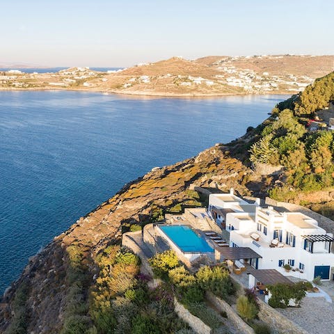 Stay on a luxury villa complex with access to a jetty and the Aegean Sea