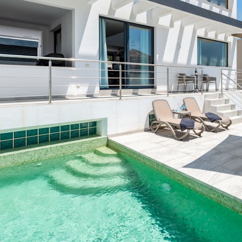 Take a dip in your private pool to cool off in the midday sun