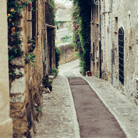 Stroll the narrow streets of Sala Comacina with a gelato