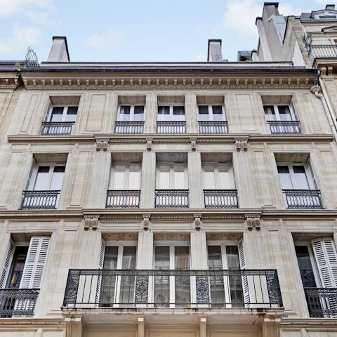 Stay in a typical Haussmann building in Paris' lively centre