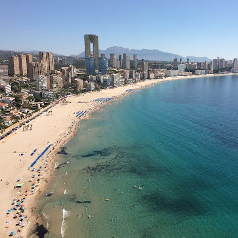 Enjoy the vibrant energy of Benidorm, with a sandy beach just moments away from your apartment 