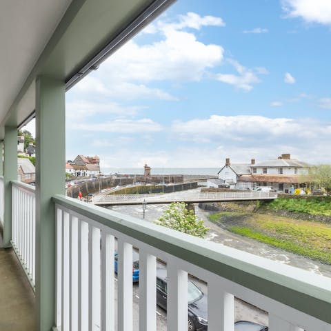 Enjoy spectacular views of the river and Lynmouth Bay from your covered balcony
