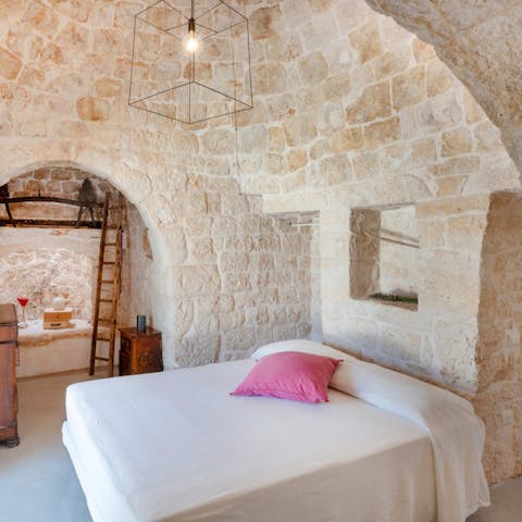 Drift off to sleep in the main house's traditional trulli-style bedrooms