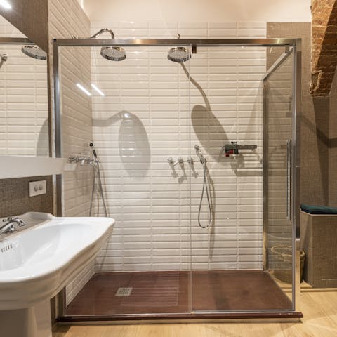 Start mornings with a relaxing soak under the dual rainfall shower
