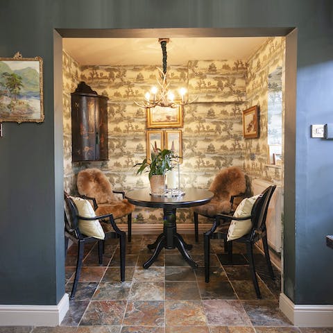 Share an intimate supper in the cosy dining nook