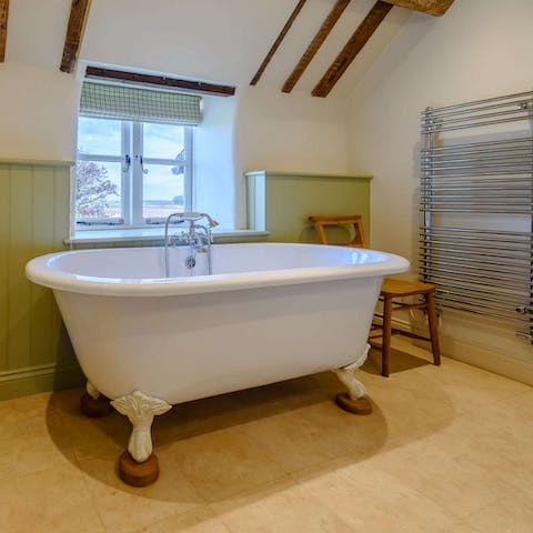 Survey the landscape from your roll-top bath
