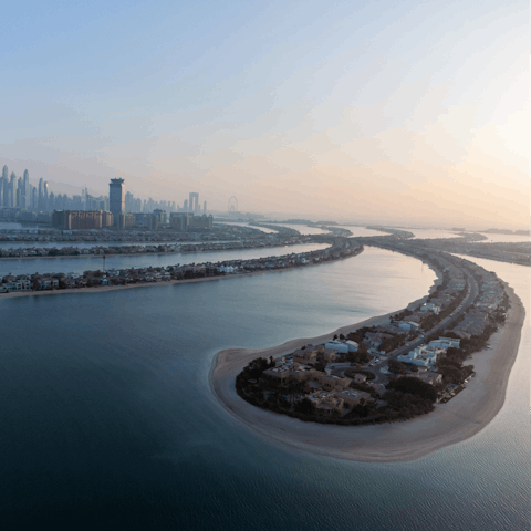 Discover the tree-shaped island of Palm Jumeirah, and all of its restaurants, bars and beach clubs