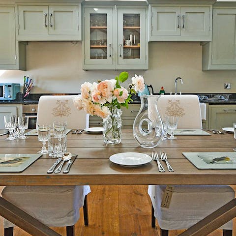 Gather together for a  meal in the country-style kitchen