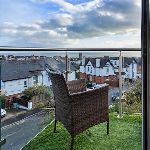 Sip coffee on the balcony as you drink in the sea views