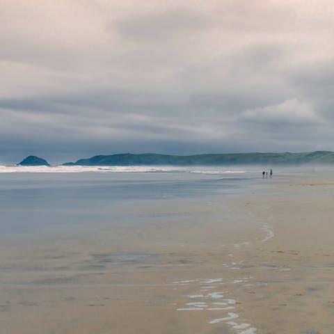 Spend an afternoon at Perranporth Beach, twenty minutes away by car