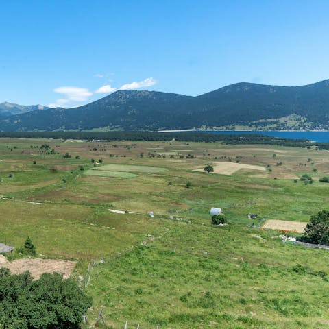 Gaze across open field from your home, all the way to the mountains and Lake Matemale 