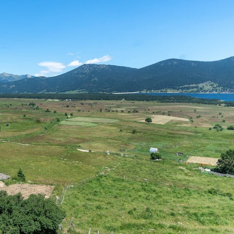 Gaze across open field from your home, all the way to the mountains and Lake Matemale