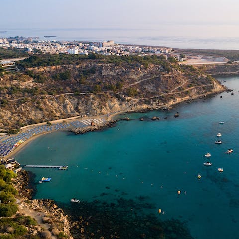 Dip your toes in the Med at Konnos Beach, a short stroll away