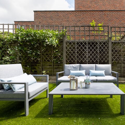 Sip your glass of bubbly out in the private garden