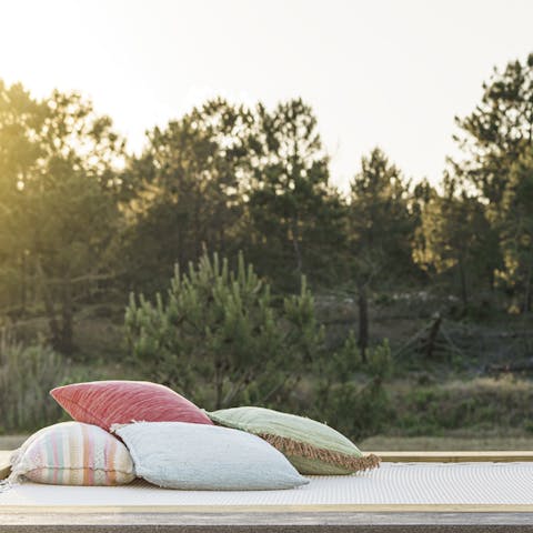 Lay out on the lounge net and watch the sky turn pink in comfort on summery evenings