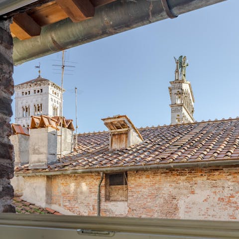 Take in views over the rooftops to the tower of of the Romanesque church of San Michele in Foro