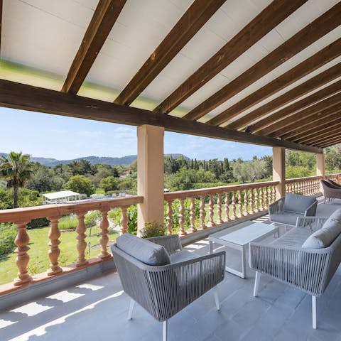 Take in the breathtaking views of the mountains in the distance from your balcony