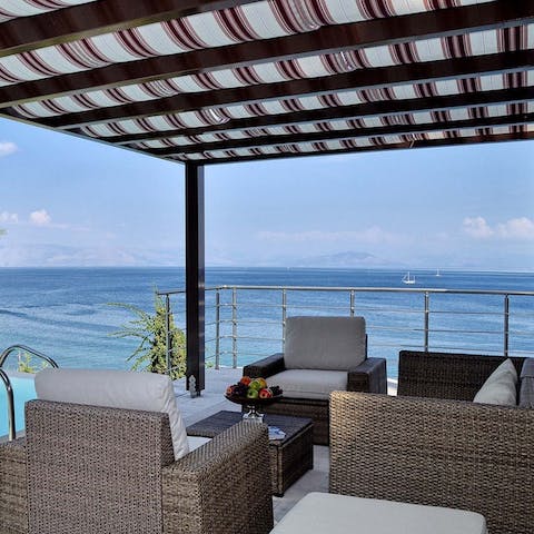 Enjoy breakfast with a view under the pergola 