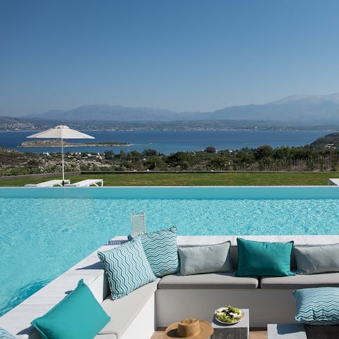 Relax on the outdoor sofa after a swim in the private pool