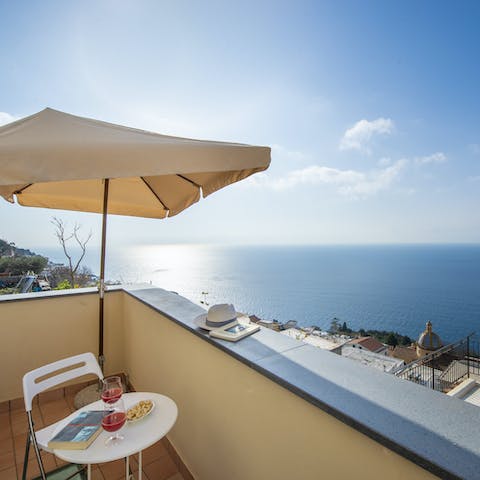 Sit peacefully as you admire the ocean views with a glass of wine