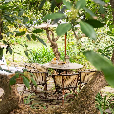 Enjoy alfresco feasts surrounded by fruit trees in the shared garden