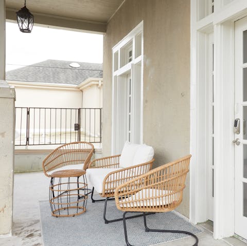 Sit out with your morning coffee on the shared balcony and watch people to and fro