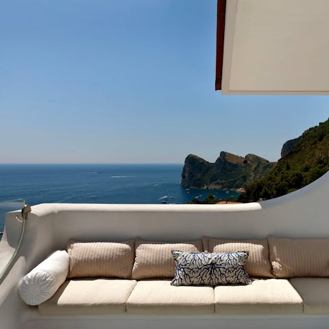 Enjoy a peaceful cup of tea on the master balcony