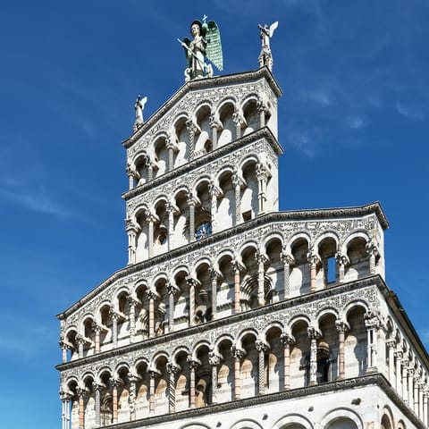 Admire the impressive sight of San Michele in Foro