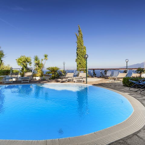 Find the height of relaxation by the pool or head to the nearby beach 