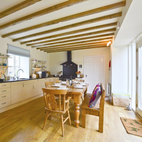 Gather your loved ones for a hearty breakfast around this oak kitchen table