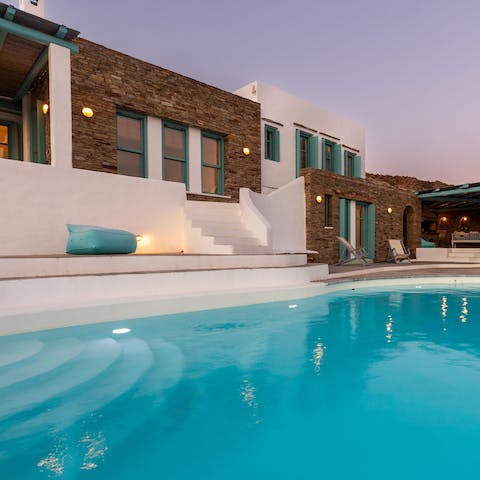 Take a twilight dip in the sparkling swimming pool