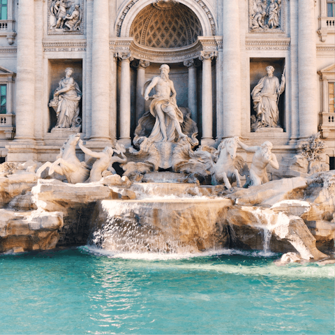 Toss a coin into the Trevi Fountain and explore the Spanish Steps