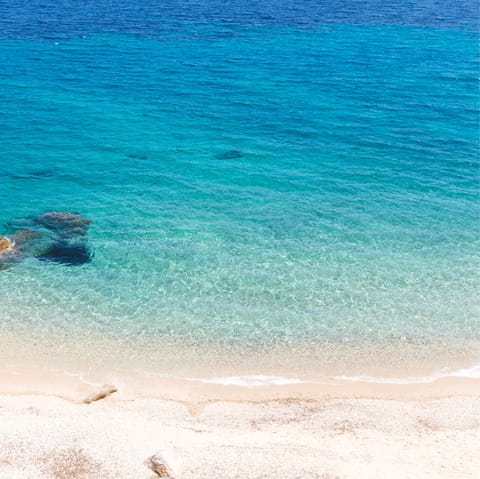 Spend unhurried afternoons on Korfos Beach, a short drive away