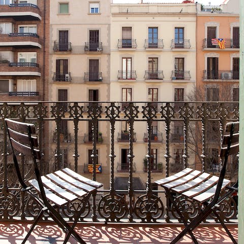 Start mornings with coffee on the balcony while taking in the buzz of the city