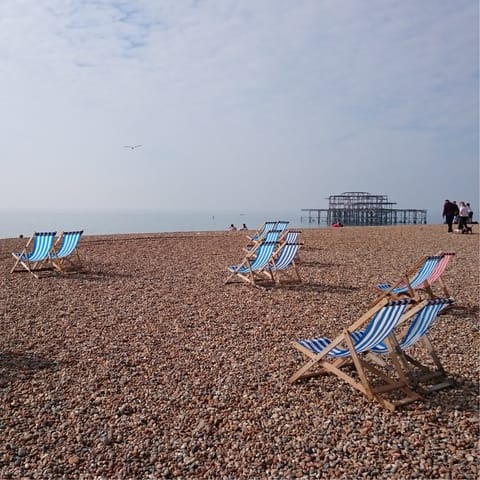 Grab a seat a catch some rays on Brighton's famous pebble beach, a little over a mile and a half away