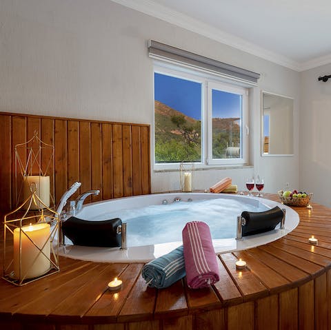 Spend evenings relaxing in the hot tub over a glass of wine