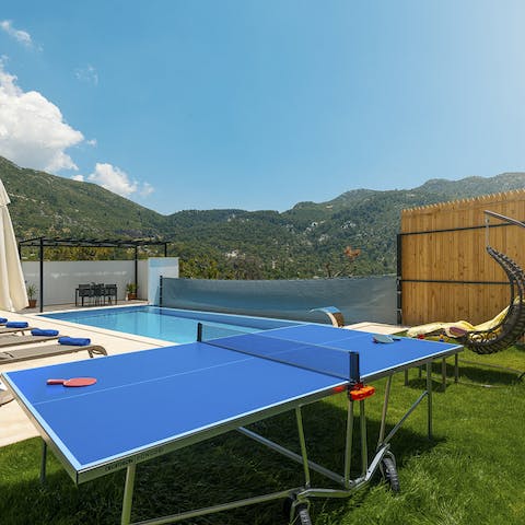Soak up some rays over a game of table tennis on the lawn