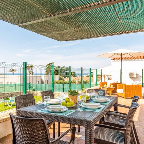 Gather the family for an alfresco feast under the pergola