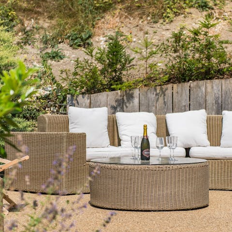 Gather around the patio seating area for an aperitif when the weather is kind