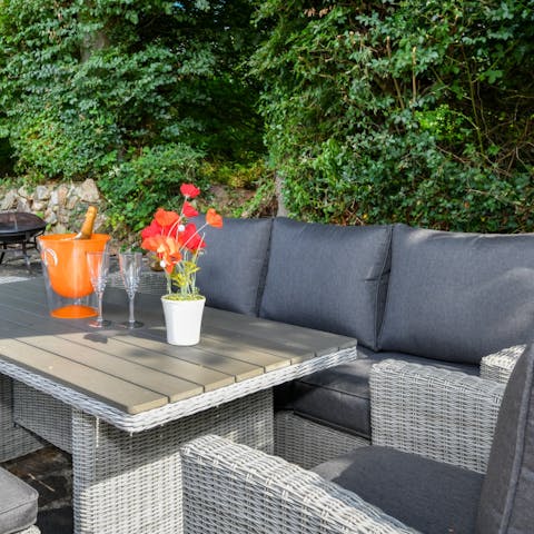 While away balmy evenings out in the garden, perfect for dining alfresco