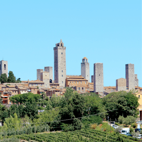 Take the scenic drive through Tuscany to San Gimignano