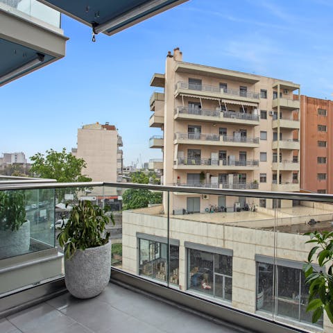 Catch some morning rays with coffees on the small private balcony