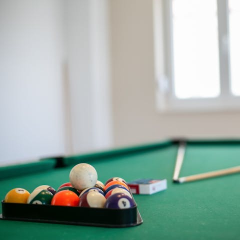 Challenge your loved ones to a game on the pool table