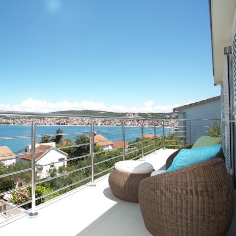 Relax on the balcony and soak up the sea views
