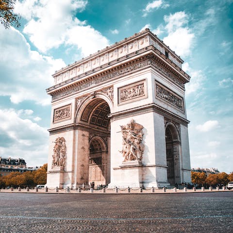 Head over to the unmistakable Arc de Triomphe