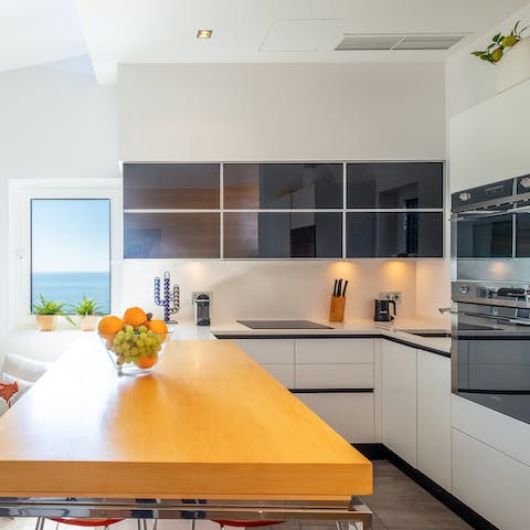 Rustle up a home-cooked meal in the sleek kitchen for a quiet evening in
