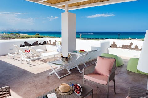 Read a book and enjoy Mediterranean Sea views from the shaded terrace