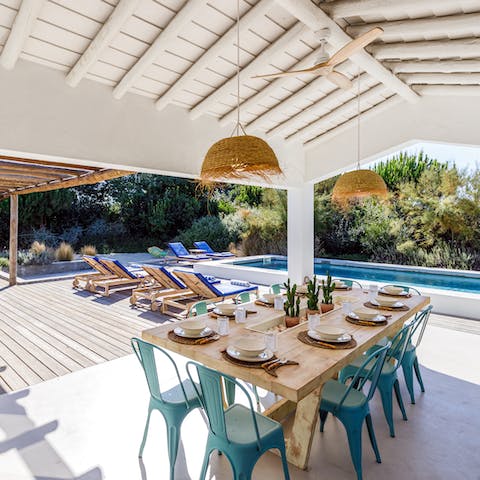 Dine on the verandah as the sun sets in the background